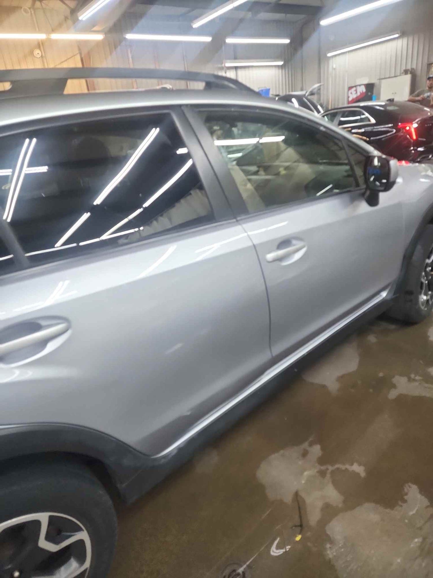 Crossover, door: after repair. The silver crossover door after repair and refinish